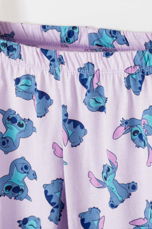 PIJAMA DE STITCH DE PANTALÓN LARGO MARFIL Y LILA PARA NIÑA