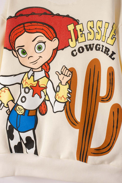 CONJUNTO DE TOY STORY CON JOGGER MARFIL Y NEGRO PARA NIÑA