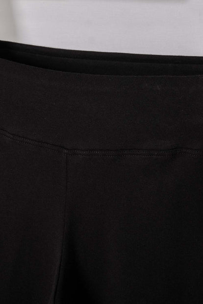 CONJUNTO DE TOY STORY CON JOGGER MARFIL Y NEGRO PARA NIÑA