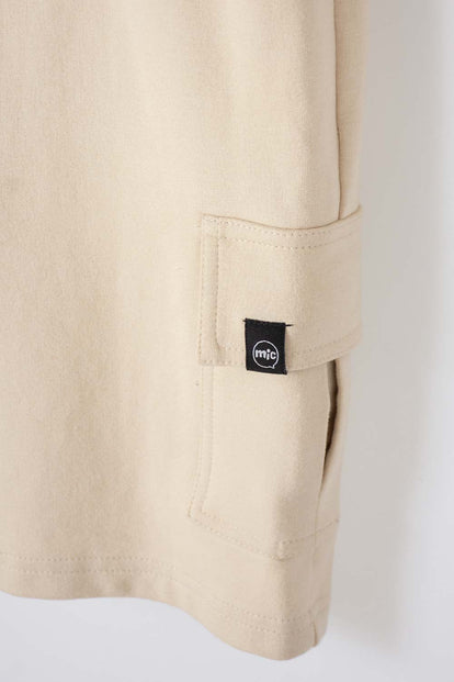 BERMUDA DE MIC CON BOLSILLOS LATERALES BEIGE PARA NIÑO