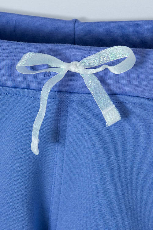 SHORT DE MIC MORADO PARA NIÑA