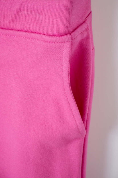 JOGGER DE MIC CON BOLSILLOS ROSADO PARA NIÑA