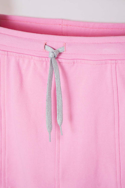 FALDA DE MIC CON BOLSILLOS ROSADA PARA NIÑA