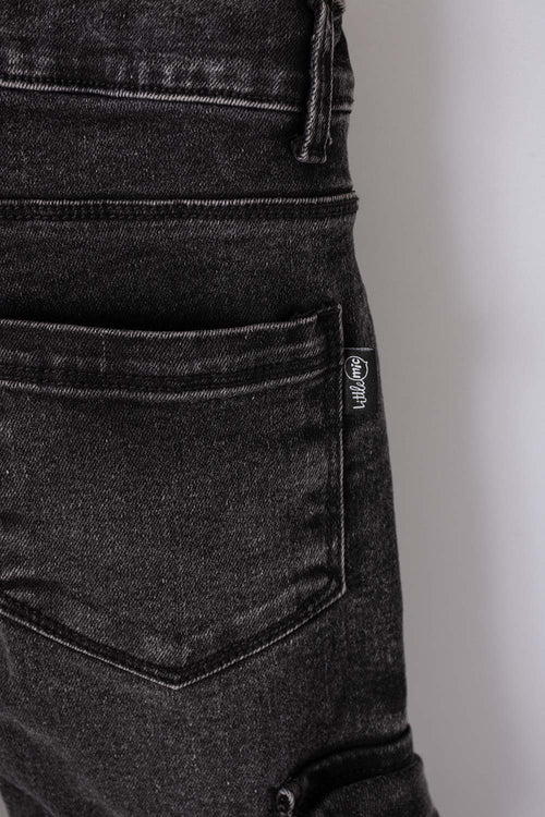 Card slide image -  JEAN LITTLEMIC EN DENIM TONO OSCURO CON BOLSILLOS TIPO CARGO PARA NIÑO 2T A 5T