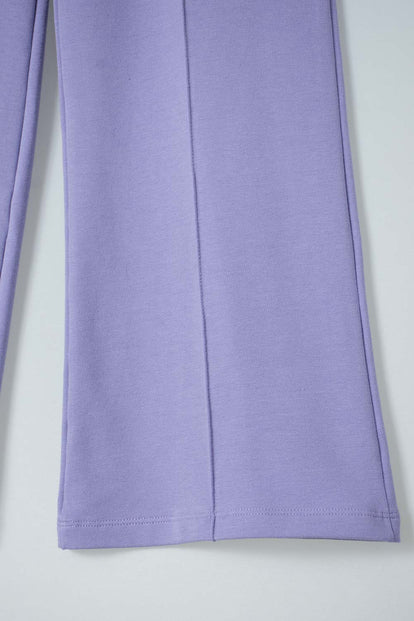 JOGGER DE MIC BOTA ANCHA MORADO PARA NIÑA