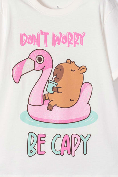 CAMISETA DE CAPYBARA MARFIL ESTAMPADA EN FRENTE PARA NIÑA