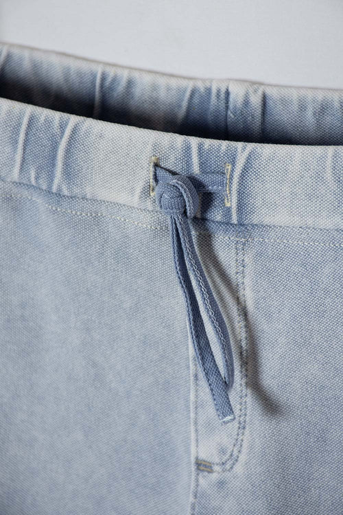 JOGGER DE MIC BOTA AMPLIA AZUL PARA NIÑA
