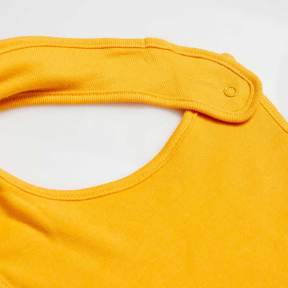 DÚO BABEROS DE WINNIE THE POOH CON BROCHE AJUSTABLE AMARILLO PARA BEBÉ NIÑA